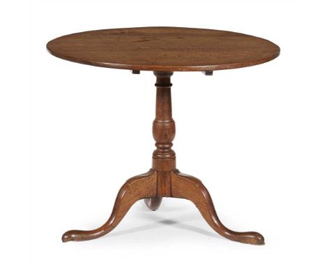 GEORGIAN PROVINCIAL ELM TRIPOD TABLE 18TH CENTURY with a plain circular top raised on a turned column and tripod base ending 