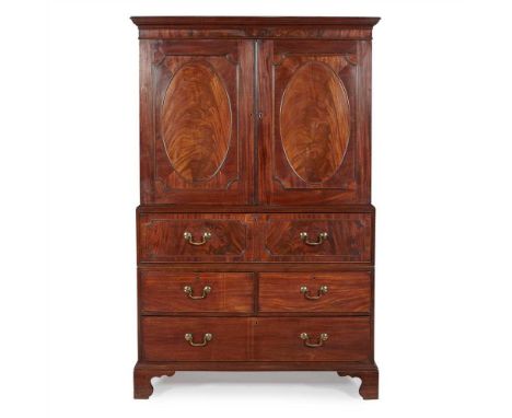 GEORGE III MAHOGANY SECRETAIRE PRESS CUPBOARD 18TH CENTURY the moulded cornice over two oval moulded panel doors enclosing th