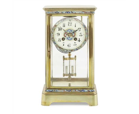 FRENCH BRASS AND CHAMPLEVÉ ENAMEL MANTEL CLOCK LATE 19TH CENTURY the four-glass case enclosing the cream enamel dial with Ara