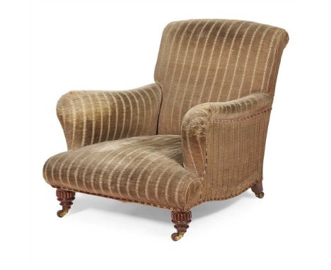 VICTORIAN HOWARD &amp; SONS STYLE UPHOLSTERED ARMCHAIR  19TH CENTURY the low scroll back above scrolled arms and a deep seat,