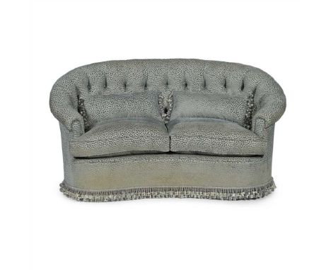 TWO SEAT TUB SOFA, BY MAPLE AND CO. 20TH CENTURY the enclosed button-upholstered back above a two cushion seat, covered in eg