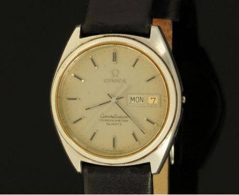 An Omega constellation chronometer, day date with replacement leather strap and original buckle.  Missing winder.