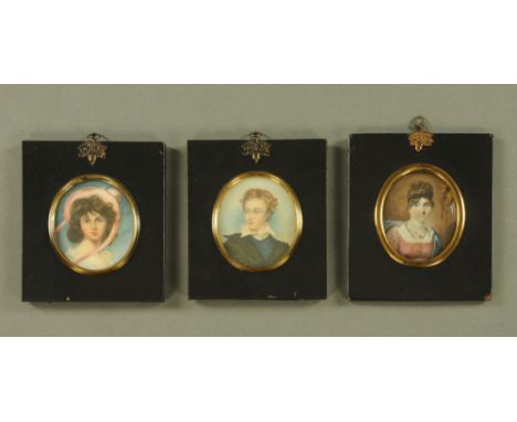 Three portrait miniatures, "Peggy Neale" 1797 and two others, each with ebonised frame and acorn hanger. CONDITION REPORT: La