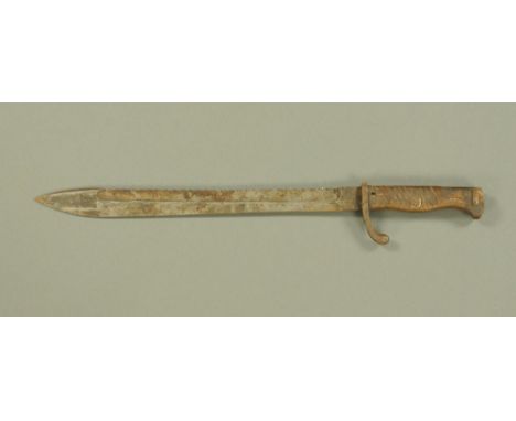 A First World War Swiss Waffenfabrik Pioneers saw back bayonet. CONDITION REPORT: The blade is extremely dirty and does have 