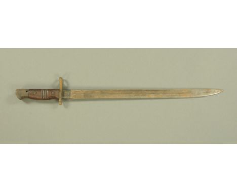 A first World War model 1918 Remington bayonet, stamped US 25 to reverse of blade. CONDITION REPORT: slight grip damage