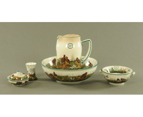 A Wemyss pottery five piece toilet set, decorated with grouse, pheasants and ducks within green rims, each piece monogrammed 