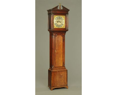 A George III mahogany and walnut longcase clock, with two train striking movement by Benson Whitehaven, the 13" silvered bras