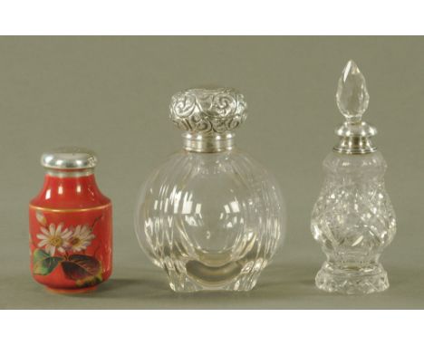A silver mounted scent bottle, London hallmark 1903, together with another cut glass scent bottle and a silver mounted pounce