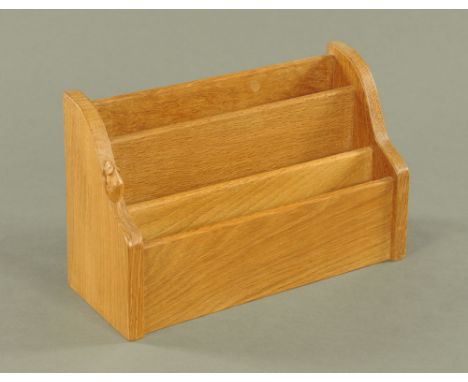 A Mouseman Thompson of Kilburn stationery rack, with typical mouse trademark.  Width 33 cm, height 21 cm, depth 13 cm (see il