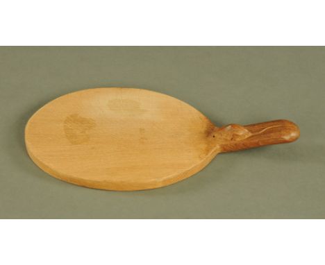 A Mouseman Thompson of Kilburn oak oval bread board, with typical mouse trademark, overall length 36.5 cm (see illustration).
