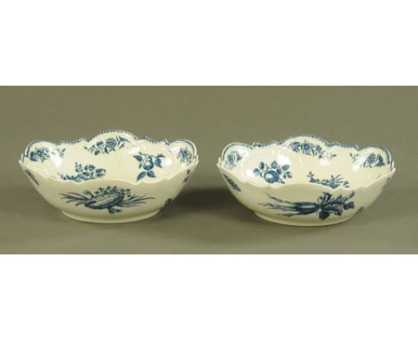 A pair of first period Worcester relief moulded salad bowls, each with autumn fruits and hatched crescent mark.  Diameter 25.