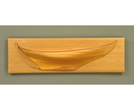 A specimen wood half hull yacht model.  Length 71 cm, height 21.5 cm.