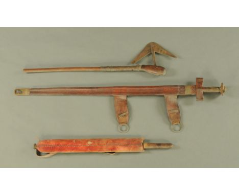 An Eastern sword with leather covered hilt and leather covered scabbard, a similar dagger and a similar axe. CONDITION REPORT