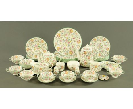 A Minton Haddon Hall patterned part dinner service, comprising 8 large plates, 8 medium plates, 4 bowls, 4 small bowls, 8 sou