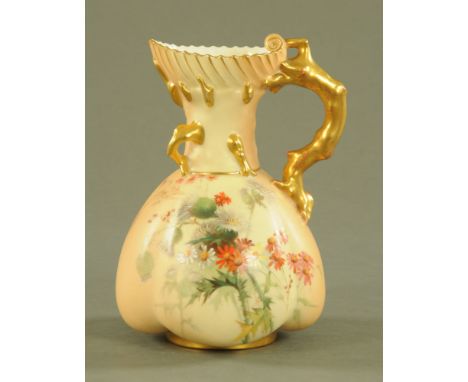 A Royal Worcester jug vase, with naturalistic handle and hand painted with thistles and floral sprays, green printed mark to 