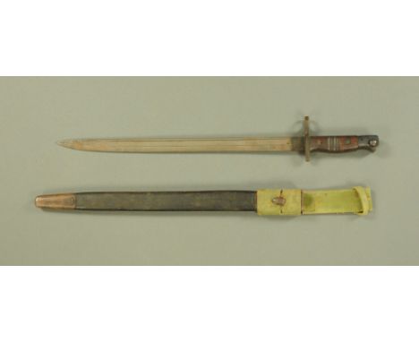 A First World War American 1917 Remington bayonet, with black leather cover scabbard.