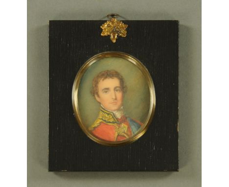 A portrait miniature on ivory The Duke of Wellington, oval in ebonised frame with acorn hanger, miniature dimensions 75 mm x 