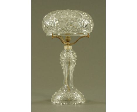 A cut glass table lamp with mushroom shaped shade.  Height 50 cm, diameter 27 cm. CONDITION REPORT: The lamp is currently lit