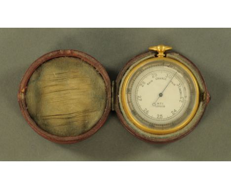 A pocket barometer by MTC London, cased.  Diameter 50 mm.