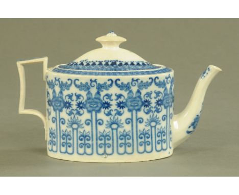 An oval pearl ware teapot, blue and white, circa 1810.  Height 14 cm, length 23 cm. CONDITION REPORT: The teapot is in genera