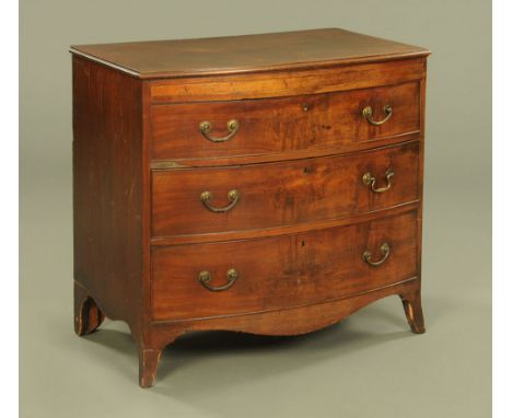 A 19th century mahogany bowfronted chest of drawers, with moulded edge, three drawers with brass drop handles and raised on s