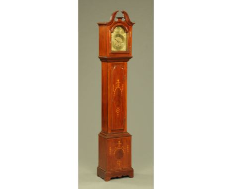 An Edwardian inlaid mahogany grandmother clock, with swans neck pediment, silvered brass dial and three train spring driven m