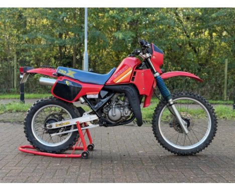 Suzuki's water-cooled 250cc two-stroke 1980s enduro bike. Imported from France, mostly original and unrestored and presented 