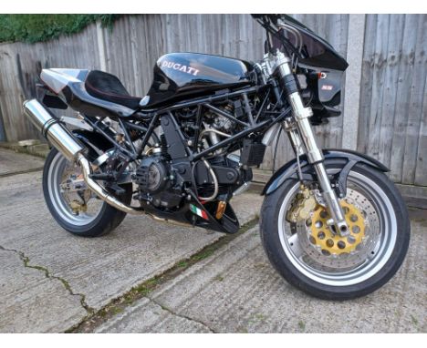 Very well customised 'streetfighter' Ducati 900SS. Polished alloys , powder-coated frame, 916 seat unit, painted engine, cust