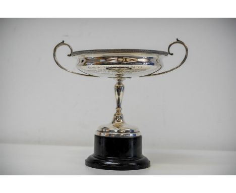19 year old Mike Hailwood took four wins at the 1958 Easter Crystal Palace race meeting and this elegant, two-handled, silver