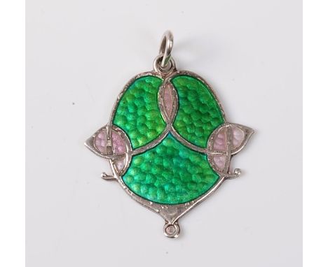 A silver and enamel Arts and Crafts pendant by James Fenton, the stylised floral disc enamelled in bright green and pale lila