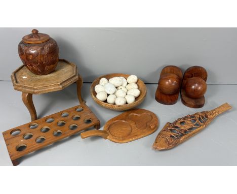 A collection of Eltex ceramic advertising eggs, 6.5 cm, and some other eggs unmarked, also a group of treen to include; egg s