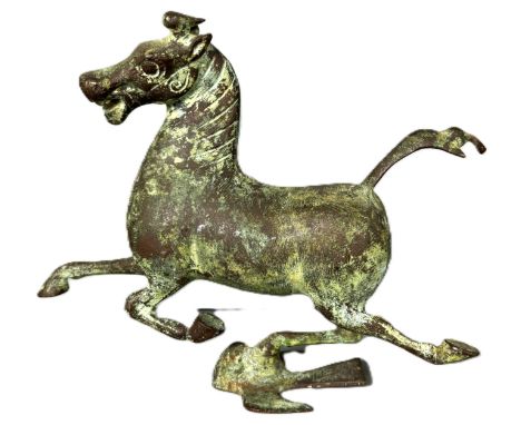 A bronze sculpture after the Flying Horse of Gansu, 17 cm.  The Alastair & Sheila Brooks Collection: of Oaklands (& past owne