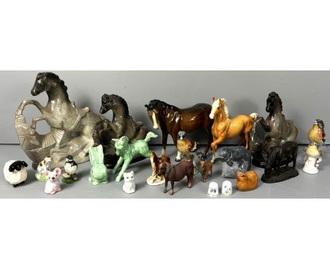 A collection of animal figures, to include, Beswick horses, Sylvac, Inuit carved fish, (A Lot).  The Alastair & Sheila Brooks