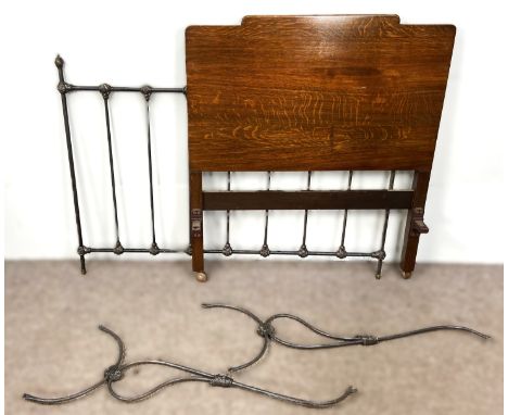 A  metal bed end, 130 x 93 cm, also an oak headboard and two metal brackets, possible console table supports, (3).  The Alast