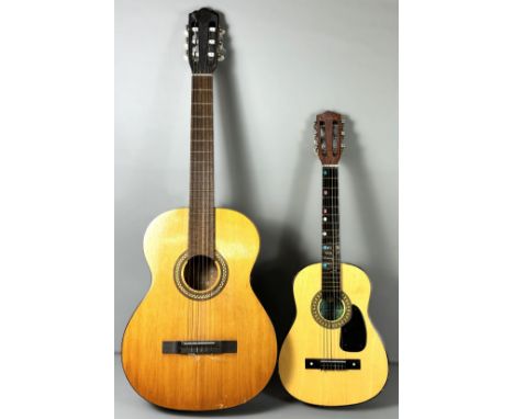 A child's Skylark guitar, 76 cm, another guitar and a violin with hard case, (3).&nbsp;