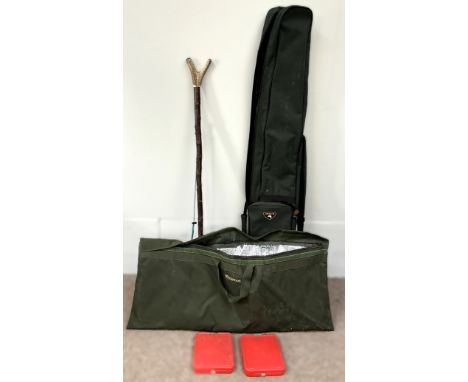 A Pro-x fishing rod bag, along with a fish cooler bag and a horn topped thumb stick, (3).    The Alastair & Sheila Brooks Col