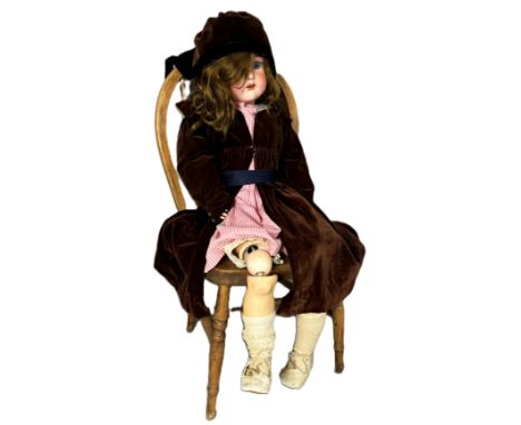 A Kammer and Reinhardt doll, number 66, 60cm, with child's chair and basket of child's clothes (A Lot).