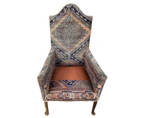 A highbacked armchair in kilim upholstery, 126 x 70 x 70 cm.  The Alastair & Sheila Brooks Collection: of Oaklands (& past ow