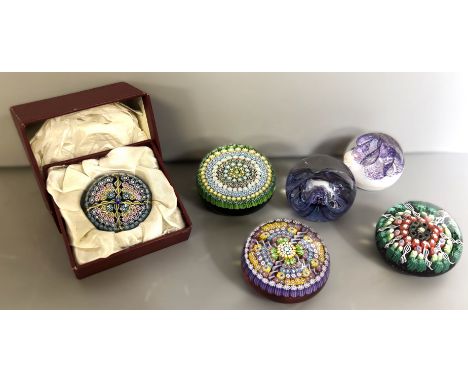 A collection of glass paperweights, to include: three Perthshire, dated 1983, 1990, third date covered by stamp, a Selkirk, a