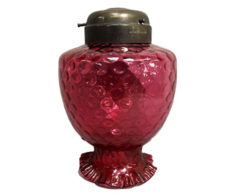 A cranberry glass lamp shade with frilled edge and dimpled interior body, 27cm.&nbsp;