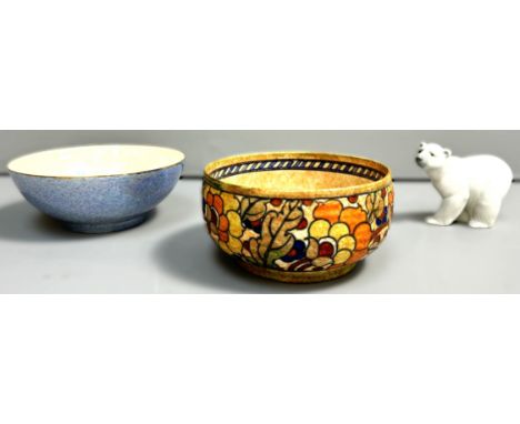 A Charlotte Rhead Crown Ducal bowl, 9cm, along with another Crown Ducal bowl and a Lladro polar bear, (3).&nbsp;