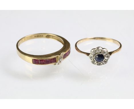 Two 9ct gold rings to include a hallmarked 9ct gold ruby and diamond ring. The ring being channel set with step cut emeralds 