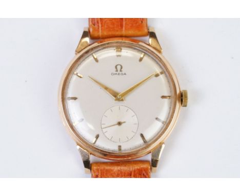 A Vintage gents Omega wristwatch, 18ct gold cased, 17 Jewel movement, cal.267, baton markers with sub second dial to 6 o'cloc