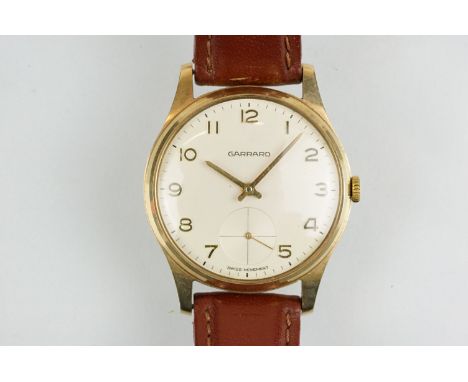 Garrard gold plated wrist watch having a cream dial with arabic numerals to the chapter ring and subsidiary dial to six. Moun
