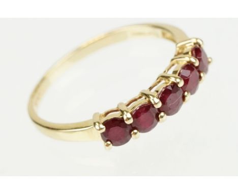 Ruby 14ct yellow gold ring, five round mixed cut rubies, diameter approx 3.5mm, shared claw settings, ring size O½ 