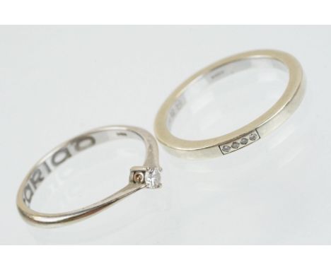 Two 9ct white gold Clogau rings to include a diamond solitaire ring (diamond estimated 0.10ct, size O.5), together with a ban