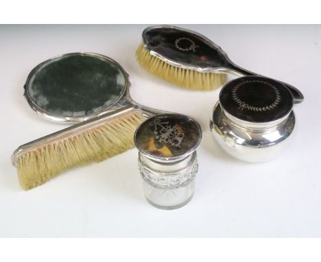 Early 20th Century silver and tortoise shell dressing table set consisting of lidded jar, hair brush, clothes brush, mirror a