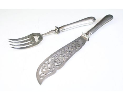 Pair of 19th Century French silver handled fish servers including pierced fork and knife. Each handle marked with French Mine