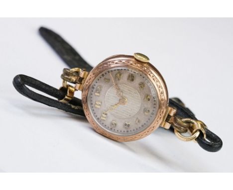 A 1930's fully hallmarked ladies Marvin 9ct gold cased wristwatch with Silvered dial, mounted to black leather strap. 