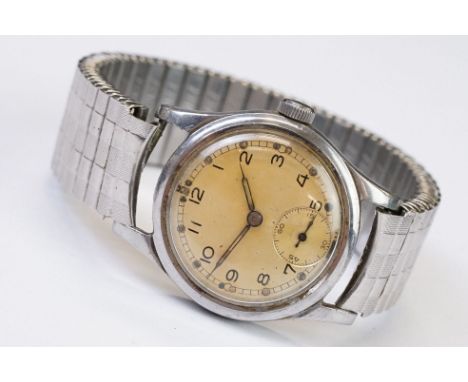 A British Military issued Army Trade Pattern wristwatch, marked A.T.P. 126666 to the verso, sub second dial to 6 o'clock. 